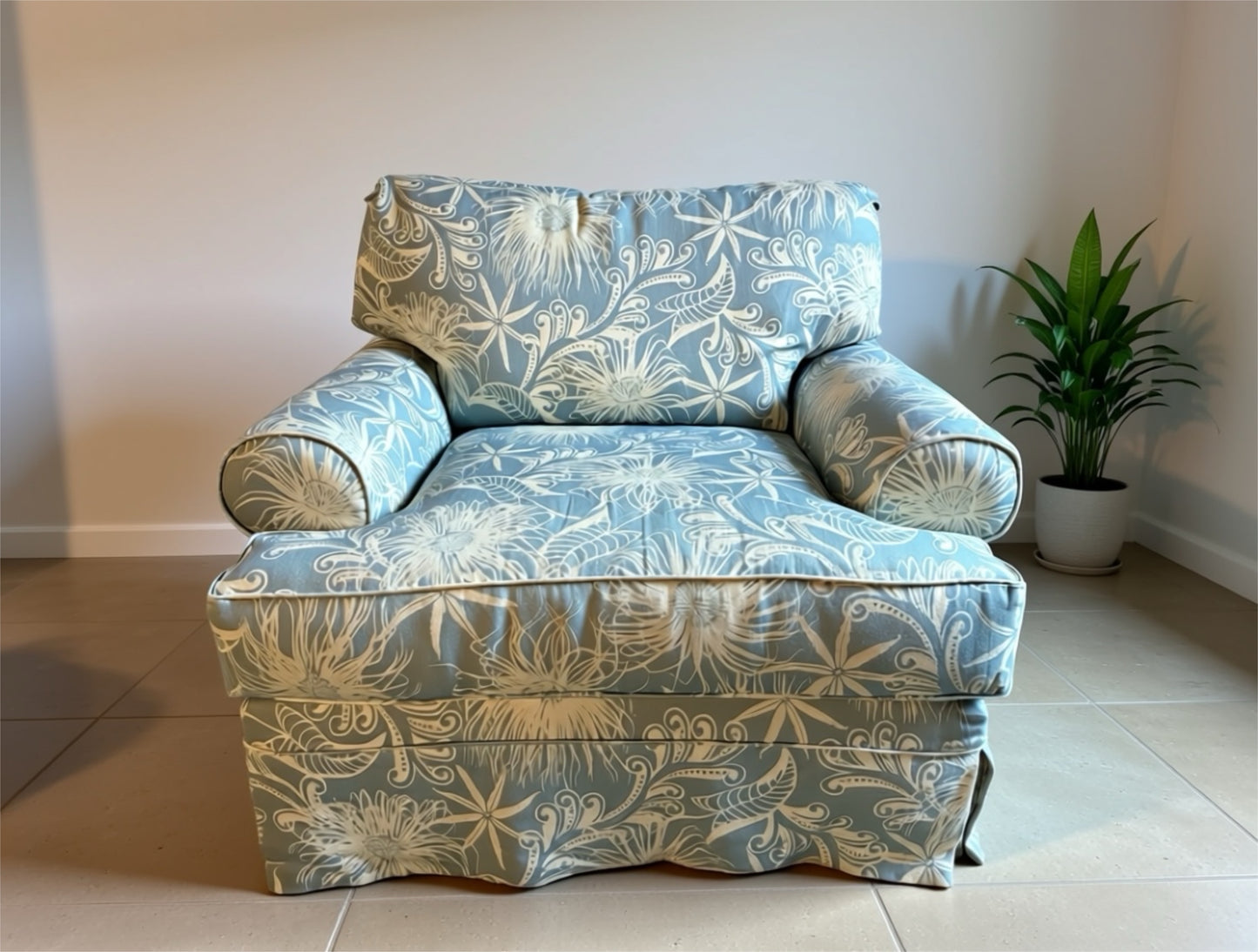 Oversized light blue and white beachy/floral arm chair