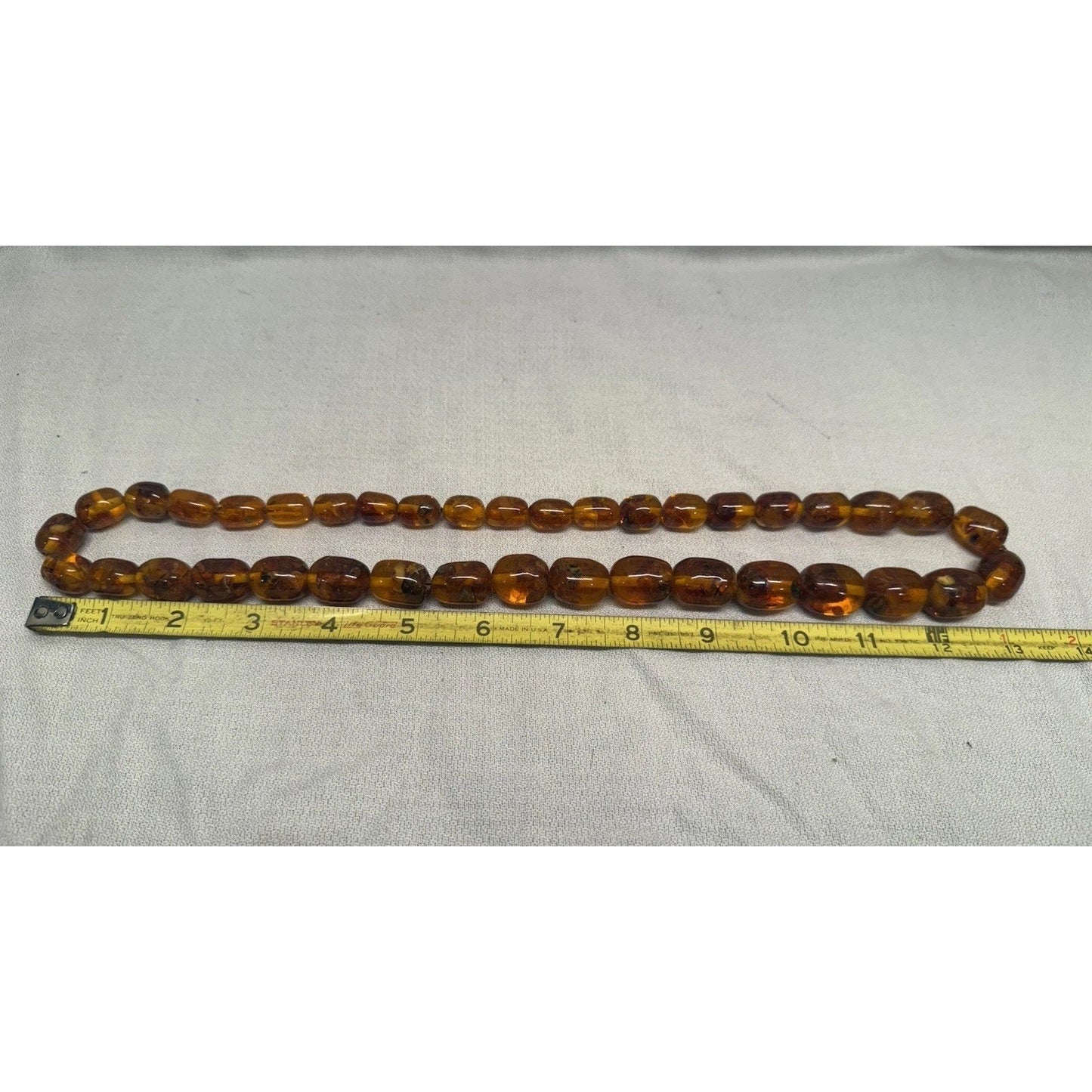 Vintage Baltic amber barrel bead necklace no clasp, pull over head approx. 13”