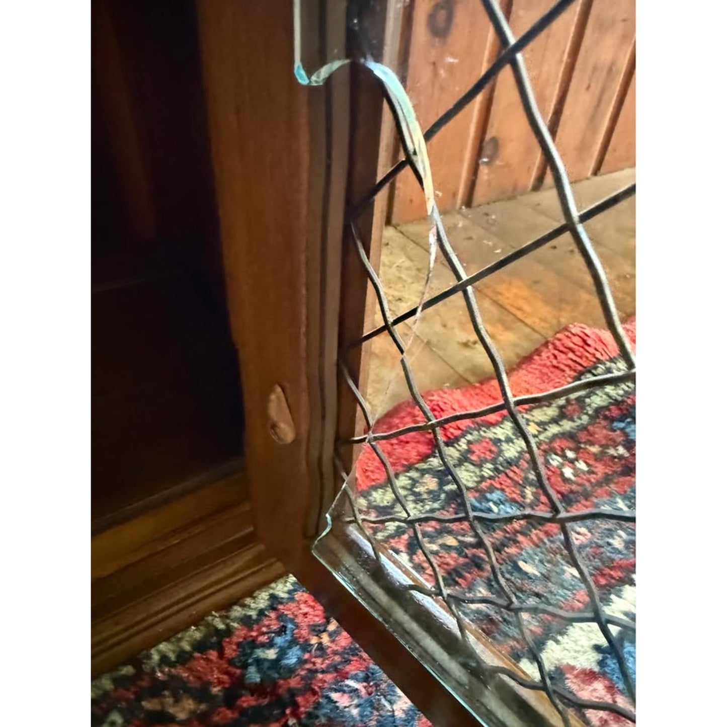 Antique wooden hutch/china cabinet/liquor cabinet with glass doors & shelves, iron detail