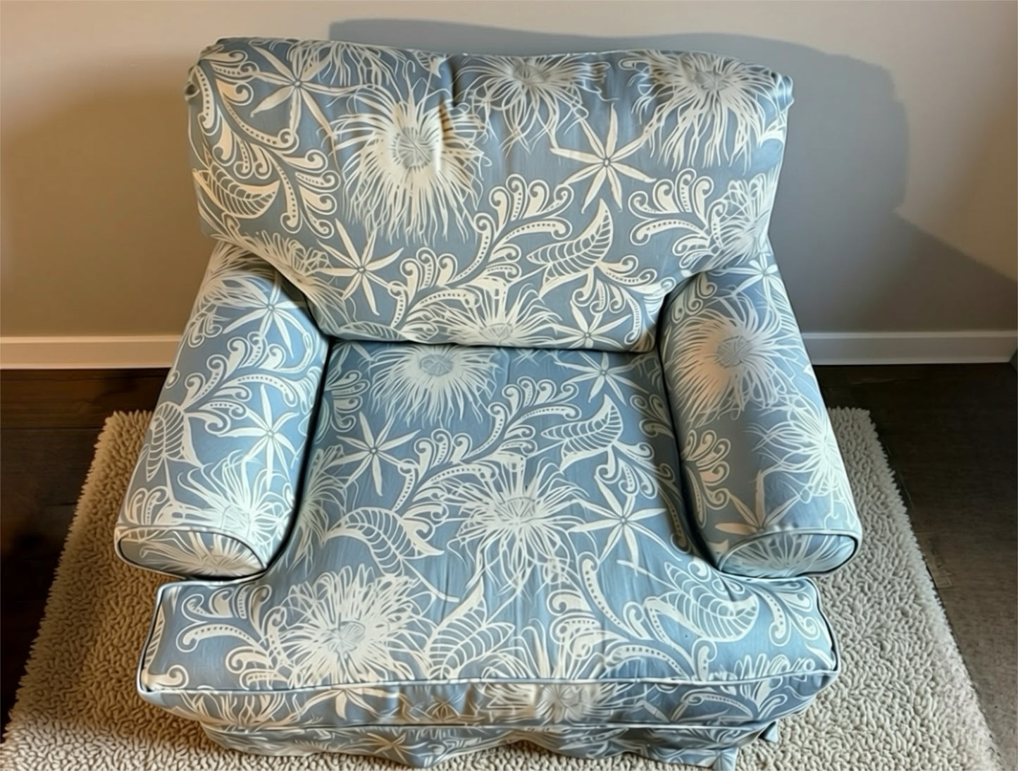 Oversized light blue and white beachy/floral arm chair