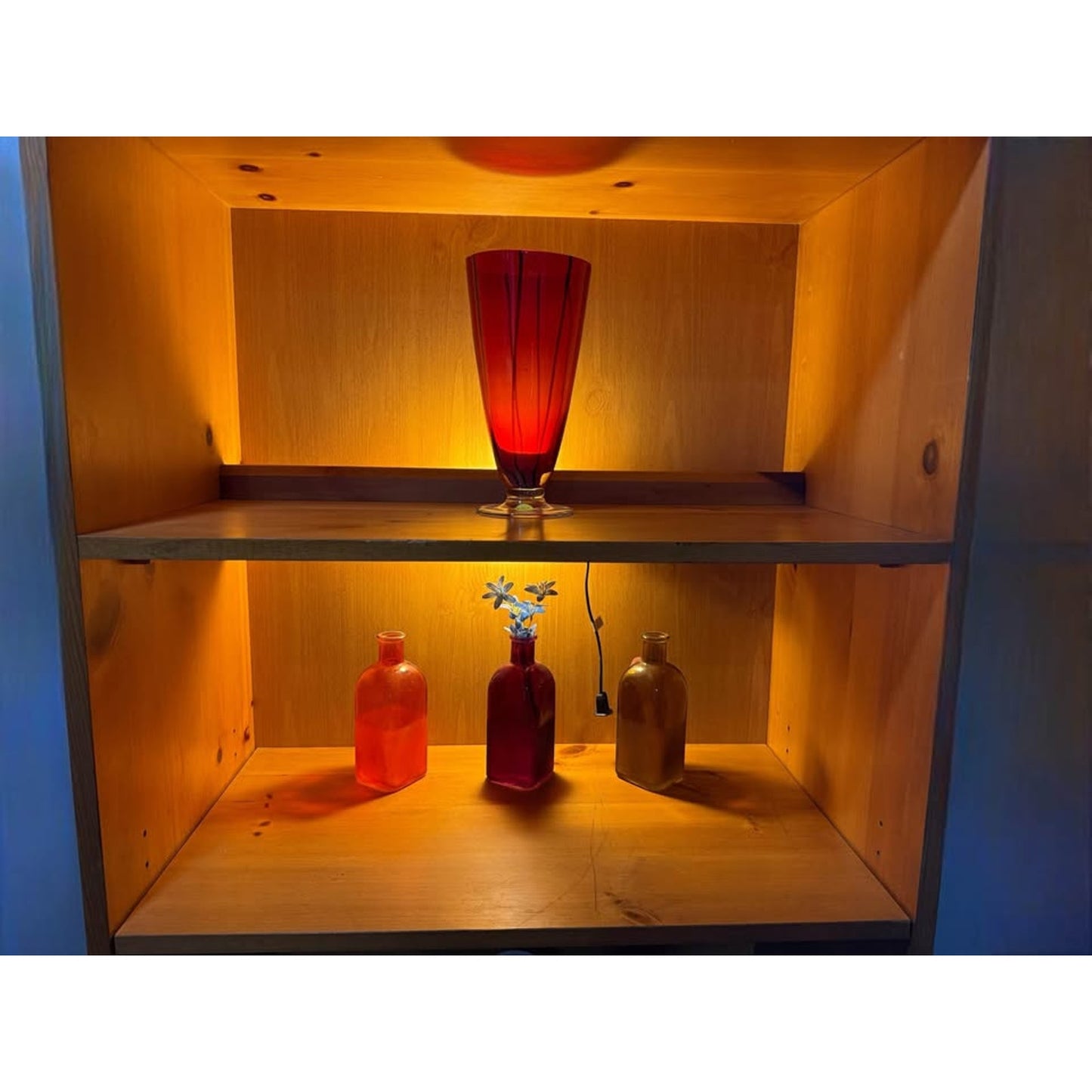 Wooden lighted bookcase/ shelf unit with lower cabinets