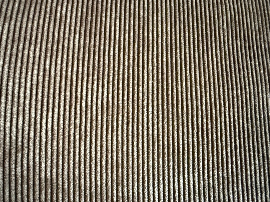 Light brown soft corduroy 7 ft long three cushion couch