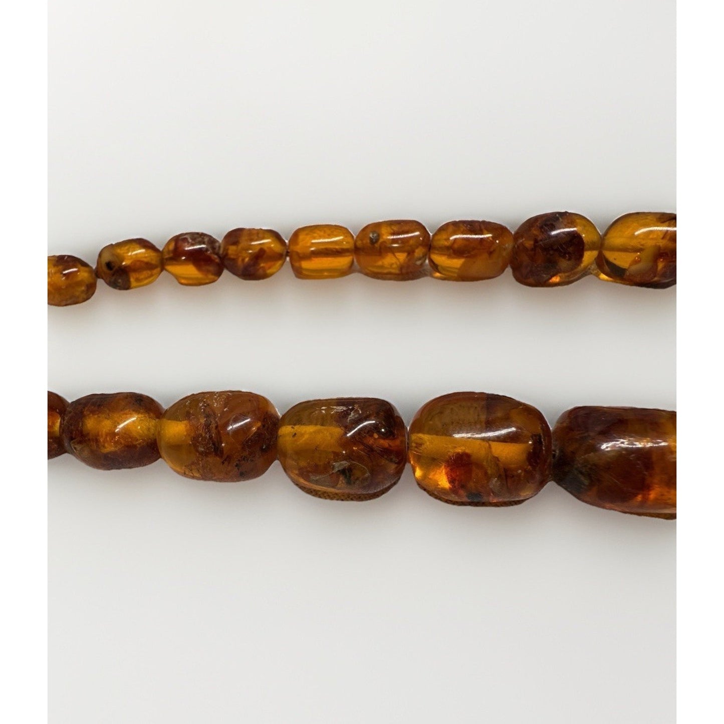 Vintage Baltic amber barrel bead necklace no clasp, pull over head approx. 13”