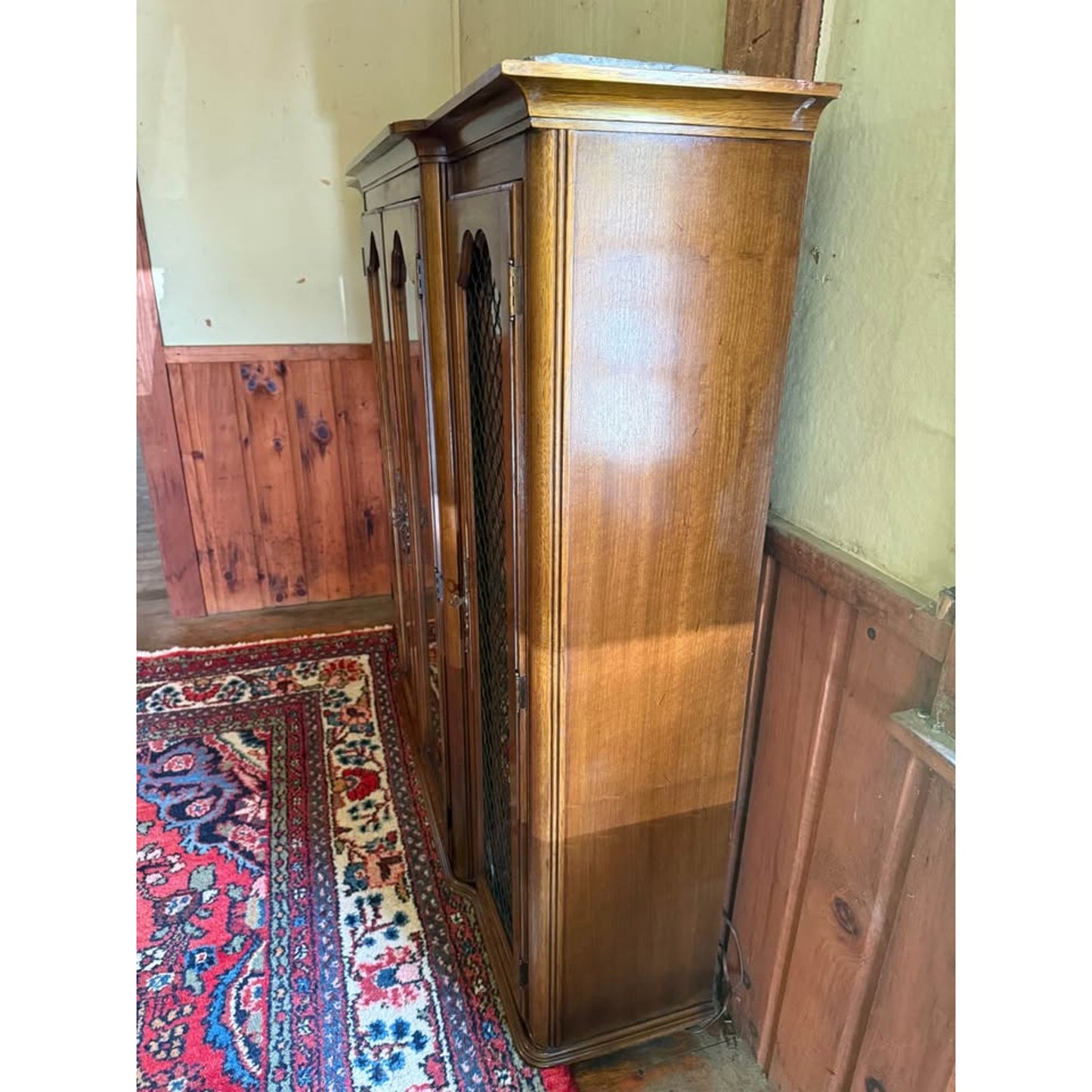 Antique wooden hutch/china cabinet/liquor cabinet with glass doors & shelves, iron detail