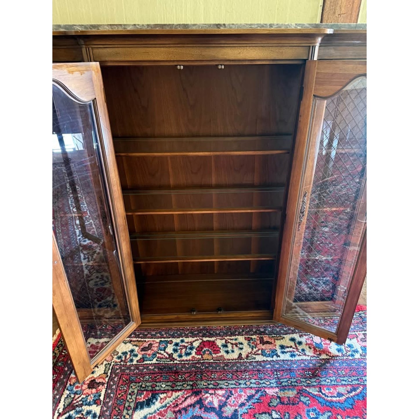 Antique wooden hutch/china cabinet/liquor cabinet with glass doors & shelves, iron detail