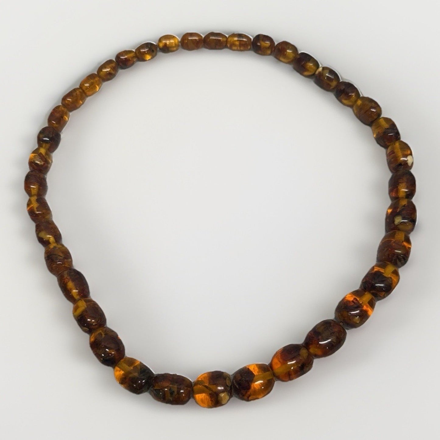Vintage Baltic amber barrel bead necklace no clasp, pull over head approx. 13”